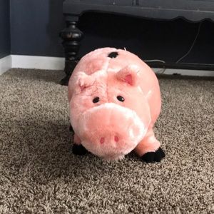 a panda, a pig, a dinosaur, and 2 puppies.